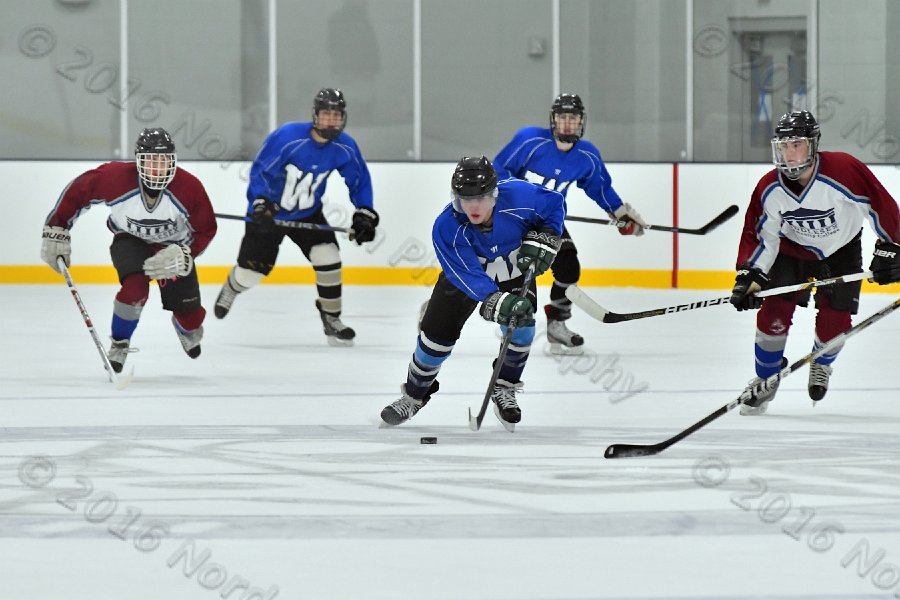 Wheaton College Men\'s Ice Hockey vs Middlesex Community College. - Photo By: KEITH NORDSTROM